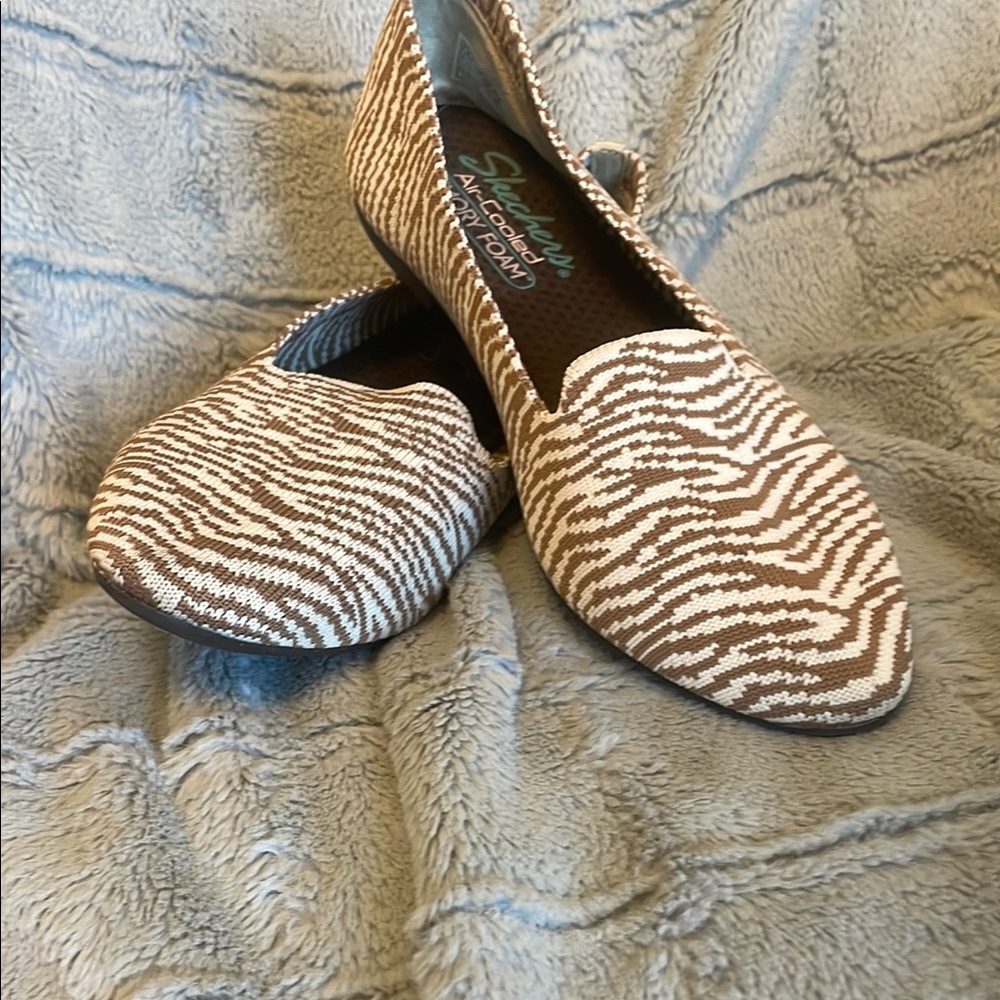 Skechers Brown and White Flats with Classic Loafer Design